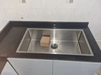 Single Large Kitchen Sink flush countertop finish with waste trap