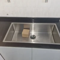 Single Large Kitchen Sink flush countertop finish with waste trap